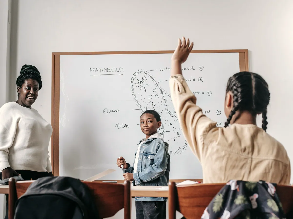 An educator working with a trainee